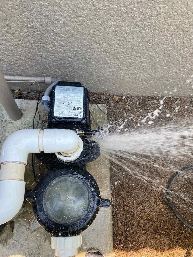 Failed pool plumbing valve actively spraying water before repair